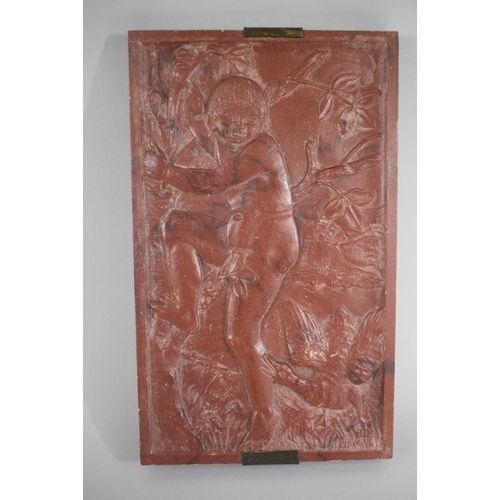 276 - An Interesting Carved Red Marble Plaque depicting Naked Boy Climbing Tree to Escape Goose. 25.5x15cm... 