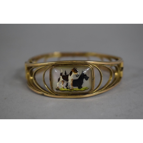 298 - A Simmons Venetian Gold Plated Bangle with Essex Style Crystal Mount Depicting Scottie Dog and Terri... 