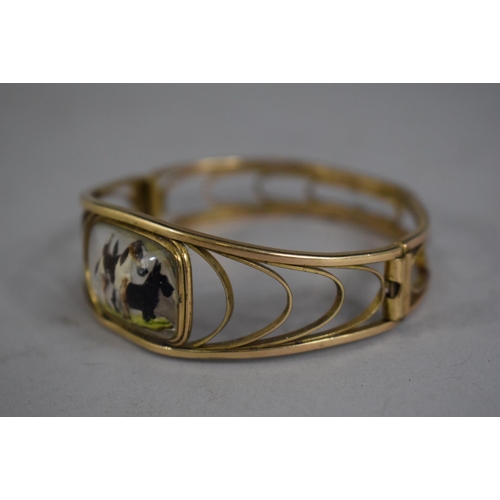 298 - A Simmons Venetian Gold Plated Bangle with Essex Style Crystal Mount Depicting Scottie Dog and Terri... 