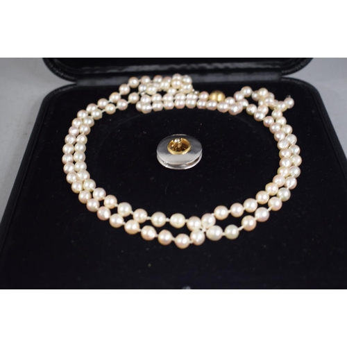 301 - Three Strands of Pink/White Pearls (Grade C) with an Opening Locket of 14k White Gold, Sapphire and ... 