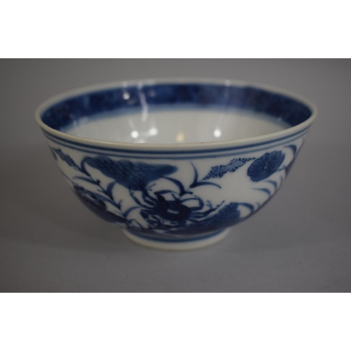 371 - An Oriental Blue and White Bowl decorated with Flowers having Underglazed Blue Four Character Mark. ... 