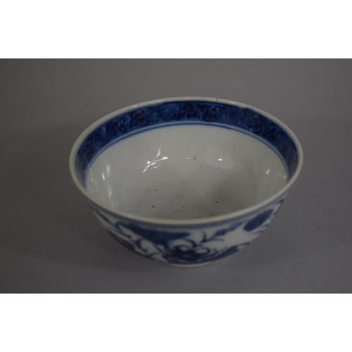 371 - An Oriental Blue and White Bowl decorated with Flowers having Underglazed Blue Four Character Mark. ... 