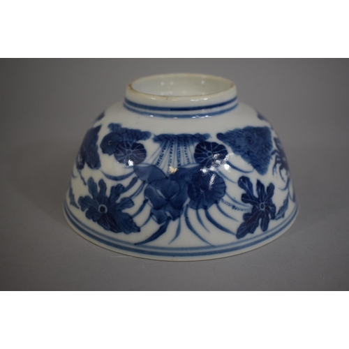 371 - An Oriental Blue and White Bowl decorated with Flowers having Underglazed Blue Four Character Mark. ... 