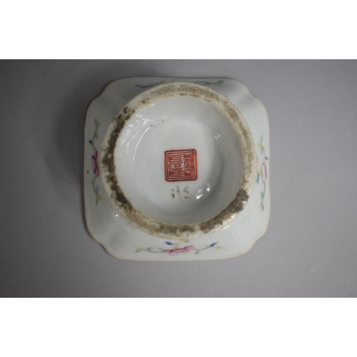 373 - A Near Pair of Chinese Circular Footed Square Topped Dishes decorated with Flowers. Red Seal Mark to... 