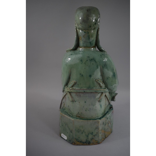 379 - An Early Glazed Chinese Stoneware Figure of Seated Immortal Wearing Robe with Lion Mask Decoration i... 