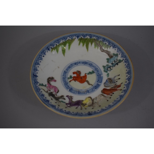 380 - An Oriental Blue and White Dish decorated in Coloured Enamels with Tree and Horses. under Glazed Blu... 