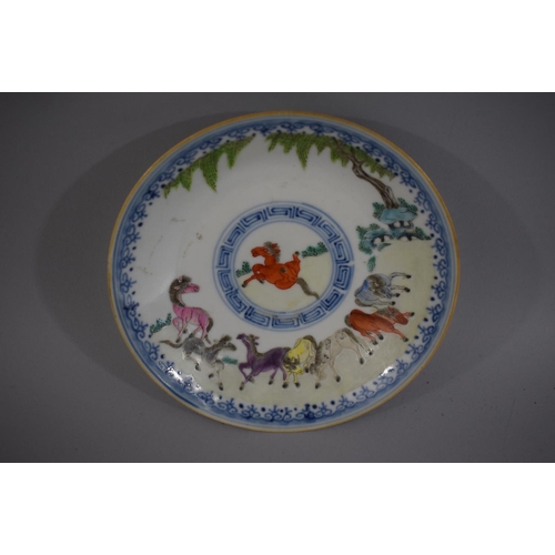 380 - An Oriental Blue and White Dish decorated in Coloured Enamels with Tree and Horses. under Glazed Blu... 