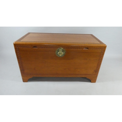 431 - A Camphor Wood Blanket Chest by Mee Sing, Kuala Lumpur. 102x53cms