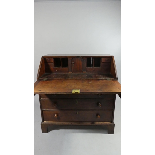 435 - A Georgian Mahogany Fall Front Bureau with Fitted Interior, Four Long Drawers and Bracket Feet. 99.5... 