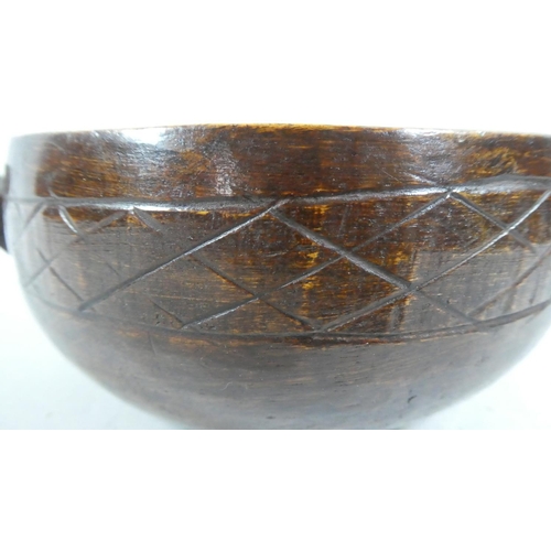 62 - An Early 20th Century Carved Scandinavian Two Handled Bowl with Chip Carved Decoration. 23cms Wide