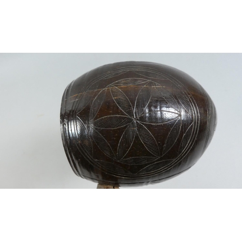 63 - A Mid 19th Century Sailor Made Water Dipper. The Bowl made from a carved Coconut Shell with a carved... 