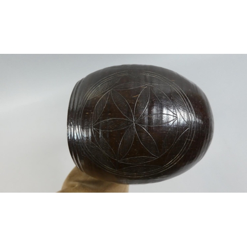 63 - A Mid 19th Century Sailor Made Water Dipper. The Bowl made from a carved Coconut Shell with a carved... 