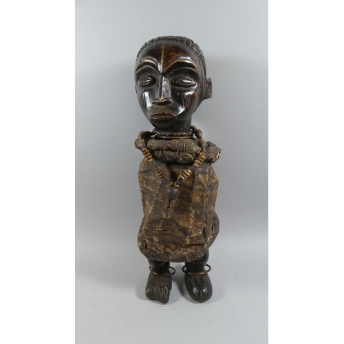 72 - An Impressive Early 20th Century Wooden African Male Figure with well Patinated Carved Detail. Weari... 