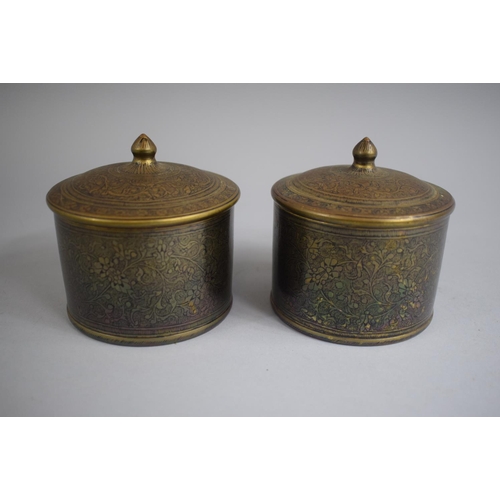 122 - A Pair of North Indian Pots with Domes Knop Handled Lids decorated with Bands of Niello Inlaid Flowe... 