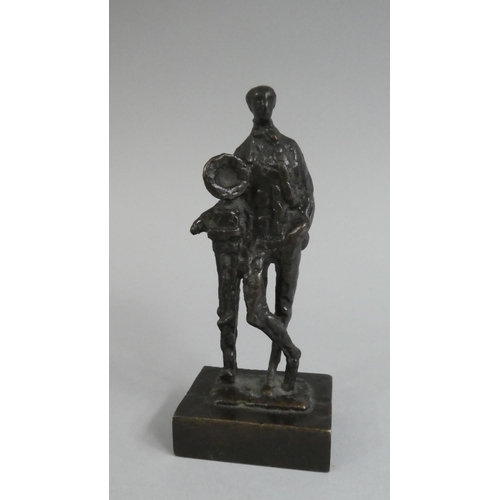 123 - A Contemporary Bronze Abstract Figure of Man Leaning on Gramophone. 11.5cms High