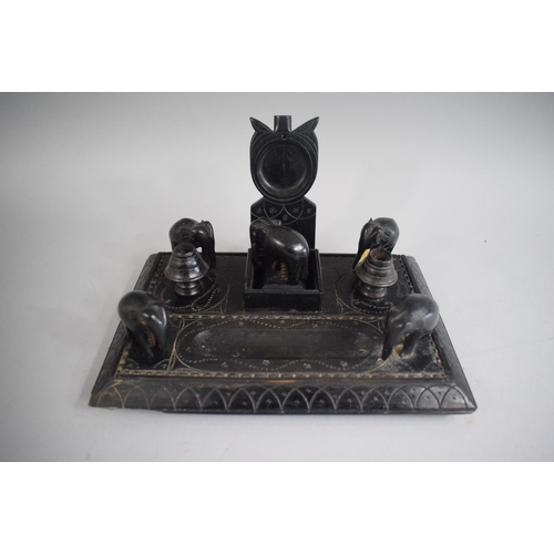 126 - A Mid/Late 20th Century Colonial Ebonised Desk Tidy with Elephant Finials (AF) (22cms Wide x 15cms H... 