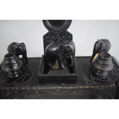 126 - A Mid/Late 20th Century Colonial Ebonised Desk Tidy with Elephant Finials (AF) (22cms Wide x 15cms H... 