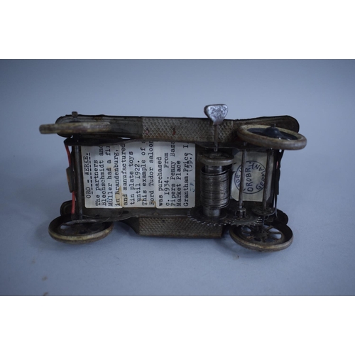 127 - A 1920s German Tin Plate Clockwork Model of a Ford Tudor Saloon, Paper Label Under. 15.5cms Wide x10... 