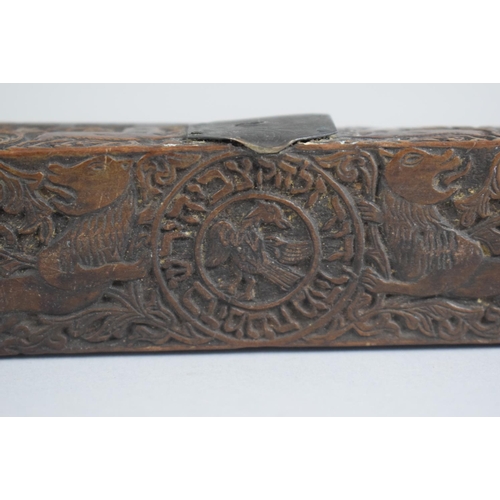 281 - An Early Hebrew Olive Wood Scribes Pen Box profusely Carved with Lions, Deer and Foliate Decoration.... 