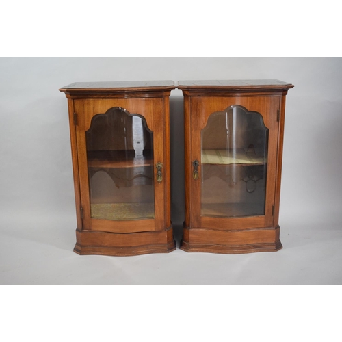 79 - A Pair of Glazed Shelved Cabinets, Each 49cms Wide. Serpentine Front.