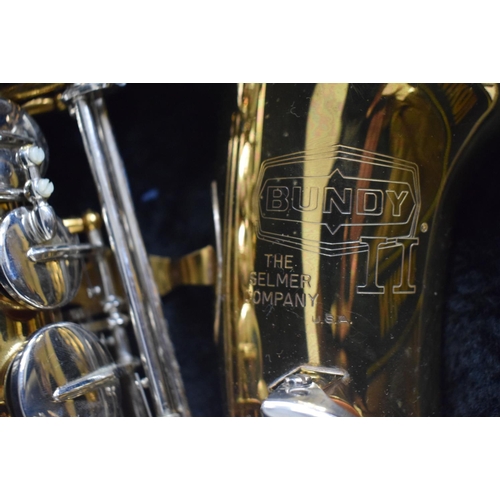 86 - A Cased Lacquered Selmer Brass Bundy II (No 1043738) Saxophone