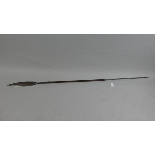 129 - An African Samburu Type Iron and Wood Double Ended Spear, One End to Tapering Square Point. The Othe... 