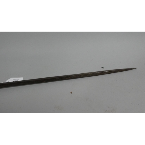 129 - An African Samburu Type Iron and Wood Double Ended Spear, One End to Tapering Square Point. The Othe... 