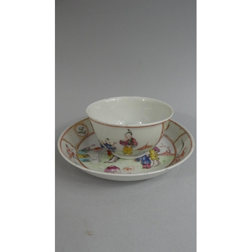 372 - A Chinese Tea Bowl and Saucer decorated with Family Scenes, Interior and Garden.