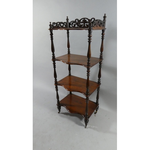 77 - A Victorian Four Shelf Mahogany Rectangular Whatnot with Turned Supports. 50cms Wide