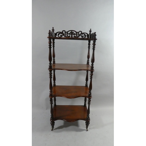 77 - A Victorian Four Shelf Mahogany Rectangular Whatnot with Turned Supports. 50cms Wide