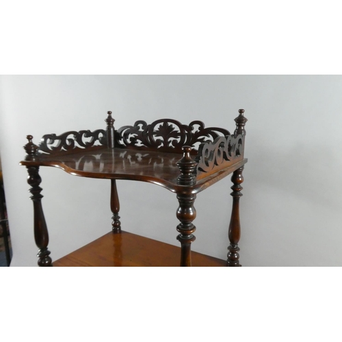 77 - A Victorian Four Shelf Mahogany Rectangular Whatnot with Turned Supports. 50cms Wide