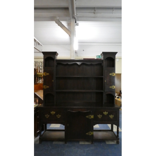 420 - A Turn of The Century Oak Arts and Crafts Influenced Dresser. The Base with Centre Cupboard flanked ... 