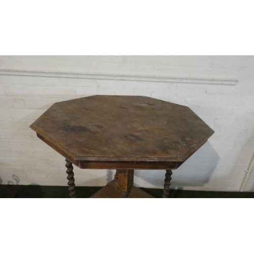 23 - An Edwardian Oak Octagonal Topped Occasional Table on Barley Twist Supports, 73cms Diameter