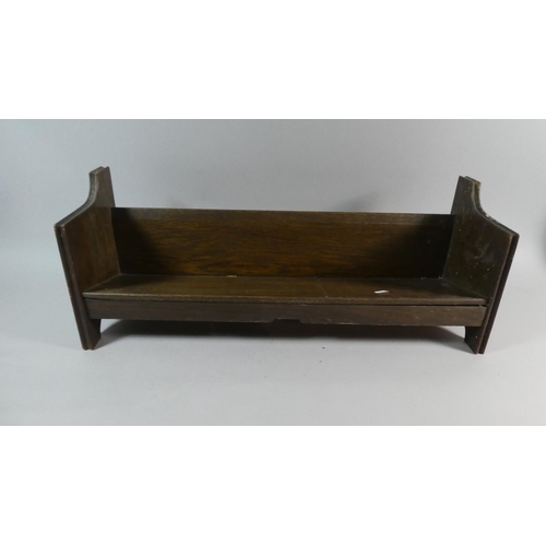 32 - An Edwardian Oak Book Trough, 64cms Wide