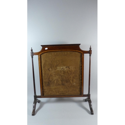 36 - An Inlaid Mahogany Tapestry Firescreen with Turned Supports, 63cms Wide