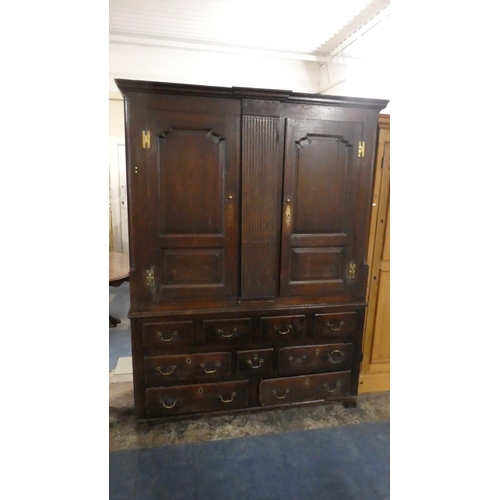 409 - An Early Georgian Oak Livery Cupboard with Panelled Doors to Hanging Sections Either Side Central Do... 