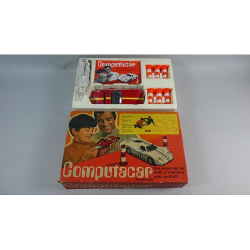 56 - A Boxed Mettoy Computacar with Instruction Booklet and Bollards