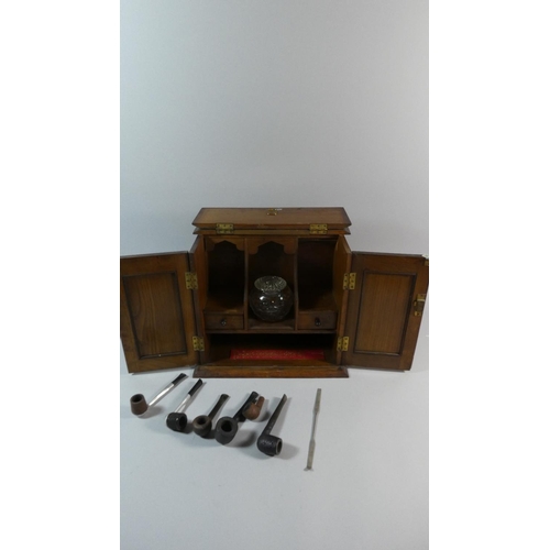 6 - An Art Nouveau Oak Smokers Box with Copper Panelled Doors having Stylised Tulip Decoration, Fitted I... 