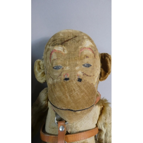 41 - A Steiff 'Jocko' Monkey Soft Toy (33cms High) with Button, Together with a Mohair Example with Leath... 