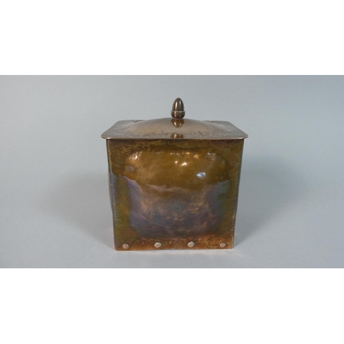1 - An Arts and Crafts Rectangular Copper Tea Caddy, the Hinged Lid and Body with Stud Work Rivets, 10cm... 