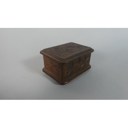 20 - A Small Carved Black Forest Wooden Rectangular Puzzle Box, 8.5cm Wide