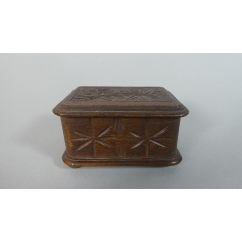 20 - A Small Carved Black Forest Wooden Rectangular Puzzle Box, 8.5cm Wide