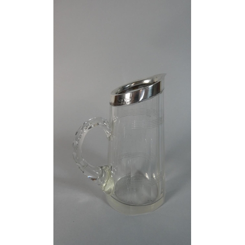 21 - A Silver Rimmed Glass Water Jug, Birmingham Hallmark, 13.5cm High