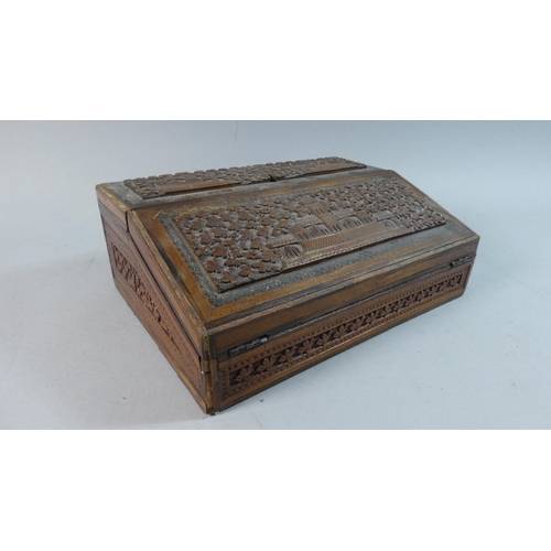 25 - An Indian Carved Wooden Writing Slope with Stationery Box Back Having Hinged Lid and Fold  Front, De... 