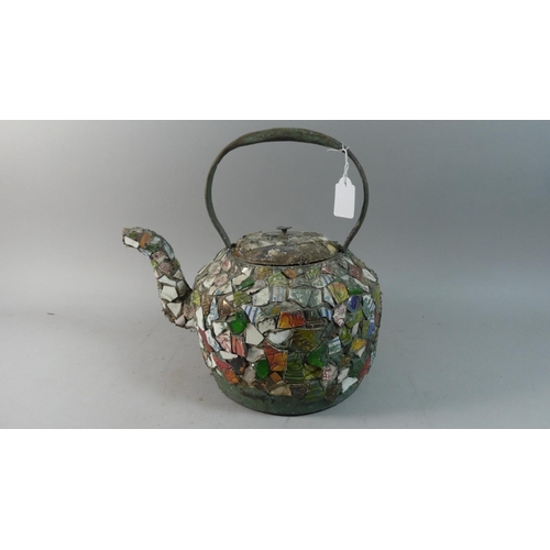 27 - A 19th Century Cast Iron Large Teapot Decorated with Shards of Ceramic Plates, Cups, Figures and a M... 