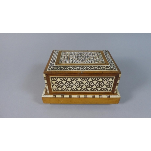 34 - An Indian Inlaid Musical Cigarette Box with Cantilevered Interior, 17cm Wide