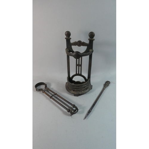 38 - An Arts and Crafts Cast Iron Fire Companion Set, Reg. 639337 Complete with Poker and Tongs, 28.5cm h... 