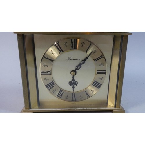 39 - A Brass Cased Timemaster Carriage Clock with Quartz Movement, 16.5cm Wide