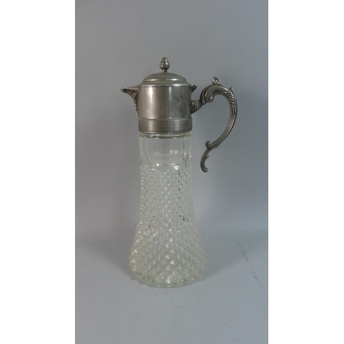 42 - A Large Silver Plate Topped Glass Claret Jug, 35cm High