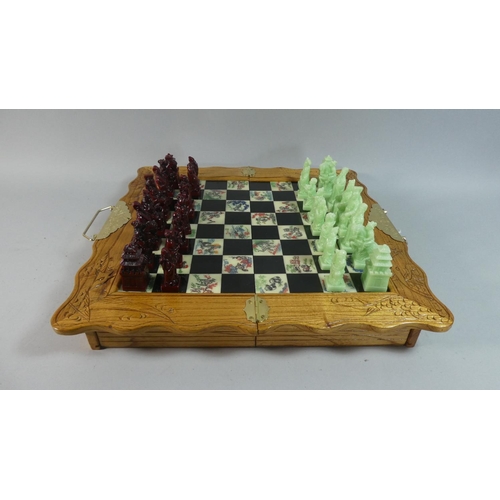 49 - A Late 20th Century Oriental Folding Chessboard with Two Drawers Containing Chinese Style Pieces, 40... 